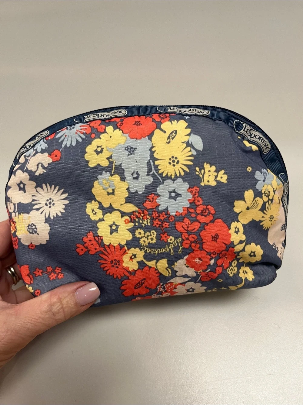 Lesportsac Blue Floral Cosmetic Pouch with Red and Yellow Accents